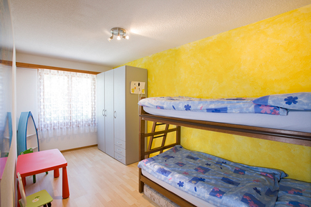 Kinderzimmer mit Kajüttenbett